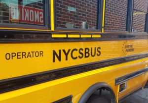 Yellow school bus with NYCSBUS in black letters